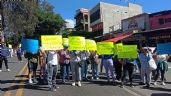 Foto ilustrativa de la nota titulada: Bloquean la México-Cuernavaca: exigen relevo de docentes en primaria de Santa María Ahuacatitlán