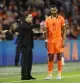 Amsterdam (Netherlands), 24/09/2026.- Netherlands national coach Xavi Hernández talks with Cody Gakpo of the Netherlands during the UEFA Nations League match between the Netherlands and Germany at the Johan Cruijff ArenA, in Amsterdam, Netherlands, 24 September 2026. (Alemania, Países Bajos; Holanda) EFE/EPA/KOEN VAN WEEL