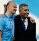 FILE -Chairman of Manchester City Khaldoon Al Mubarak, right, poses with Manchester City's Erling Haaland after the English Premier League soccer match between Manchester City and Chelsea at the Etihad Stadium in Manchester, England, May 21, 2023. (AP Photo/Jon Super, File)