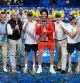 6ac4deedf1574-r_d-1497-775-347 Spain's Carlos Alcaraz and his team's members pose with the trophy after winning the men's singles final against Czechia's Jiri Lehecka at the Japan Open tennis tournament in Tokyo, Tuesday, Oct. 6, 2026. (AP Photo/Eugene Hoshiko)