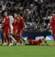 MADRID, 18/10/2026.- El centrocampista del Sevilla, Peque, se duele en el suelo durante el partido de la jornada 9 de LaLiga entre el Real Madrid y el Sevilla FC, este domingo en el estadio Santiago Bernabéu. EFE/J.J.Guillén
